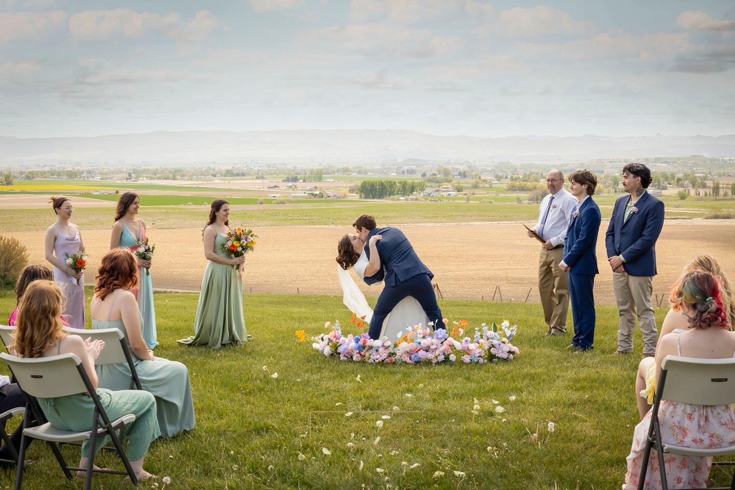 groom dipping bride for kiss