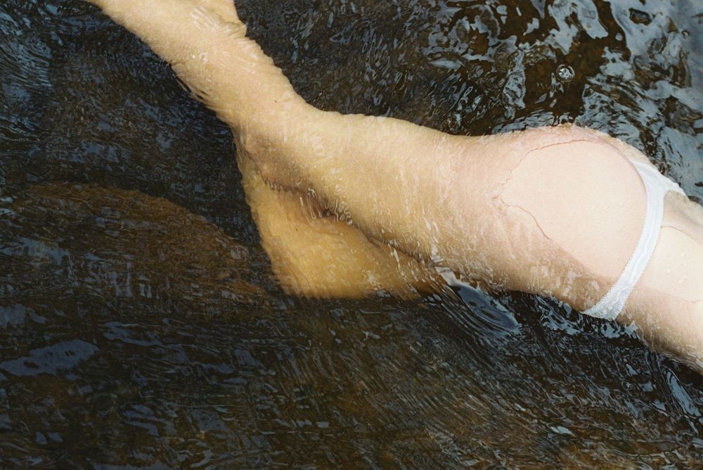 Earthy, poetic film photo exploring embodiment and connection – InBluem riverside shoot in Western Australia
