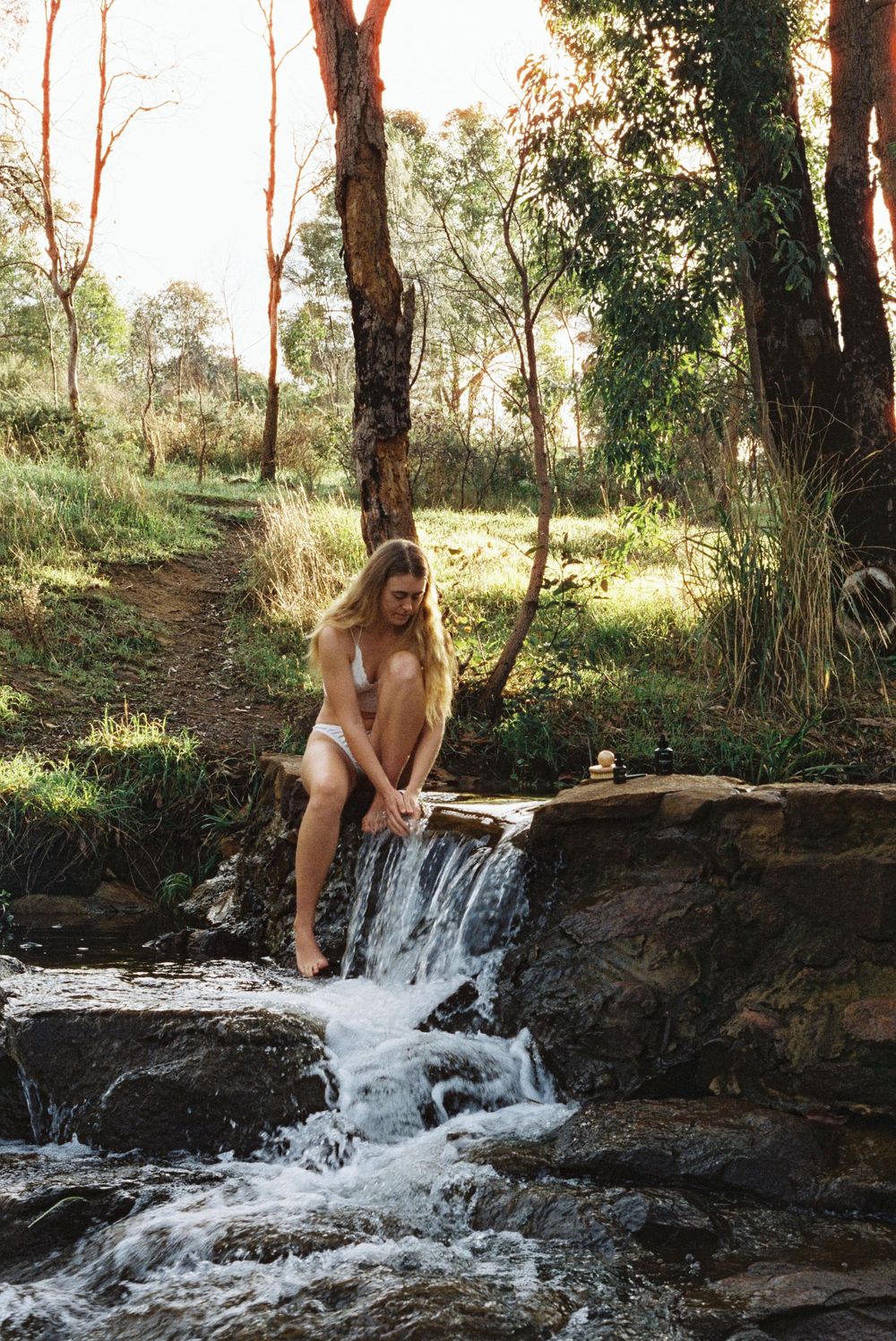 Creative branding shoot by the water with flowing tulle and earthy tones – Perth film photographer session