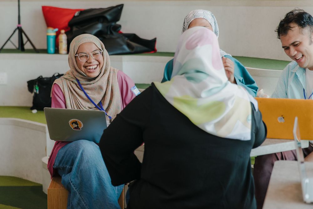Participants engaged in discussion during a workshop session.