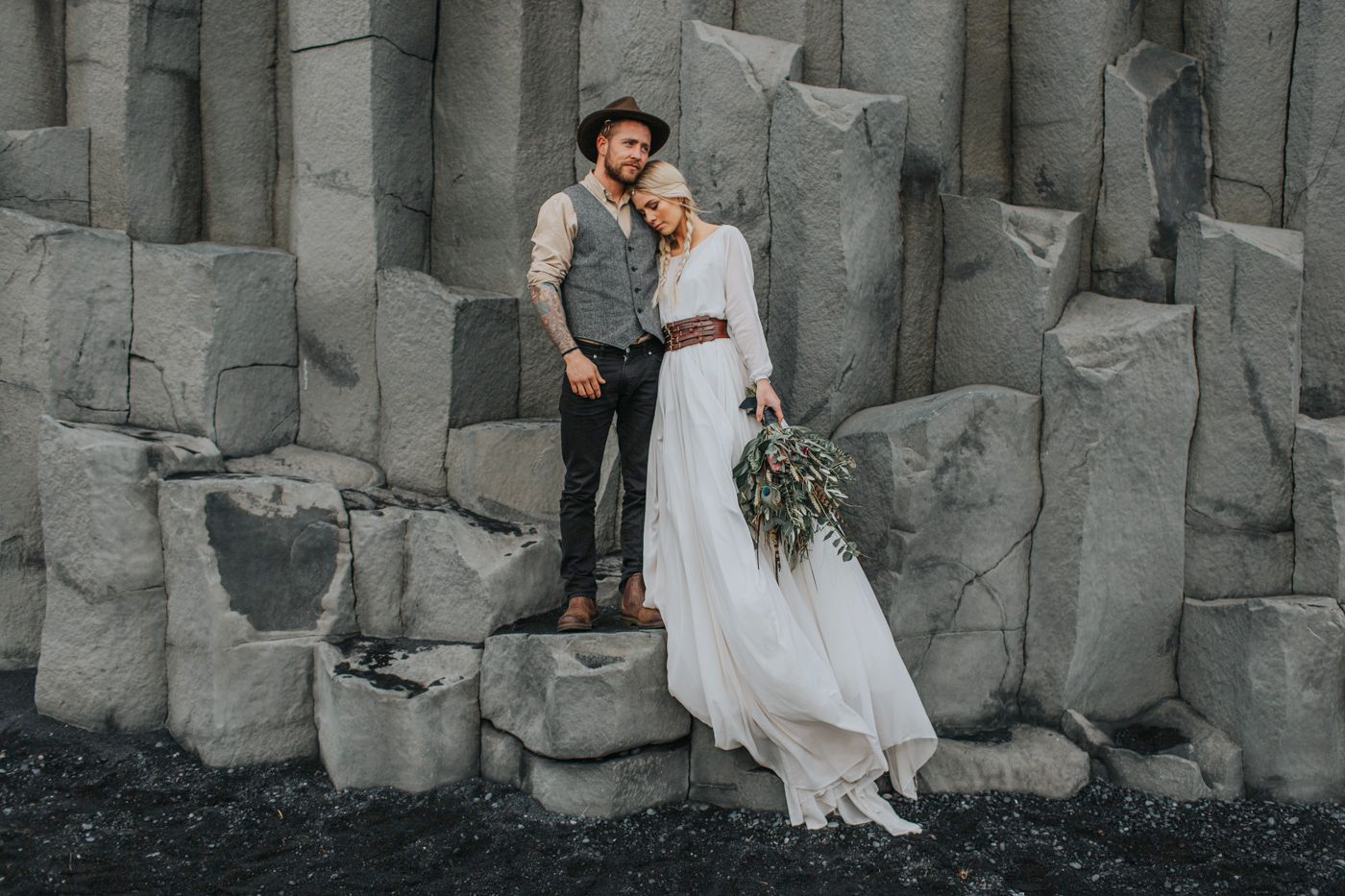 An adventurous wedding photo captured on Iceland's iconic hexagonal basalt columns.
