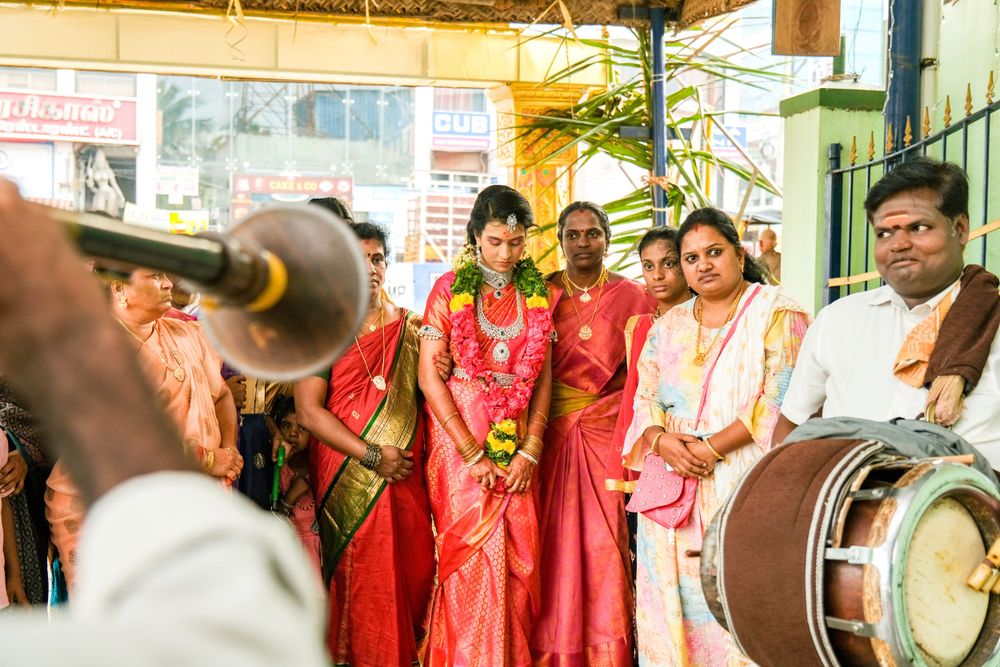 Traditional Indian celebration with musicians playing drums and instruments.