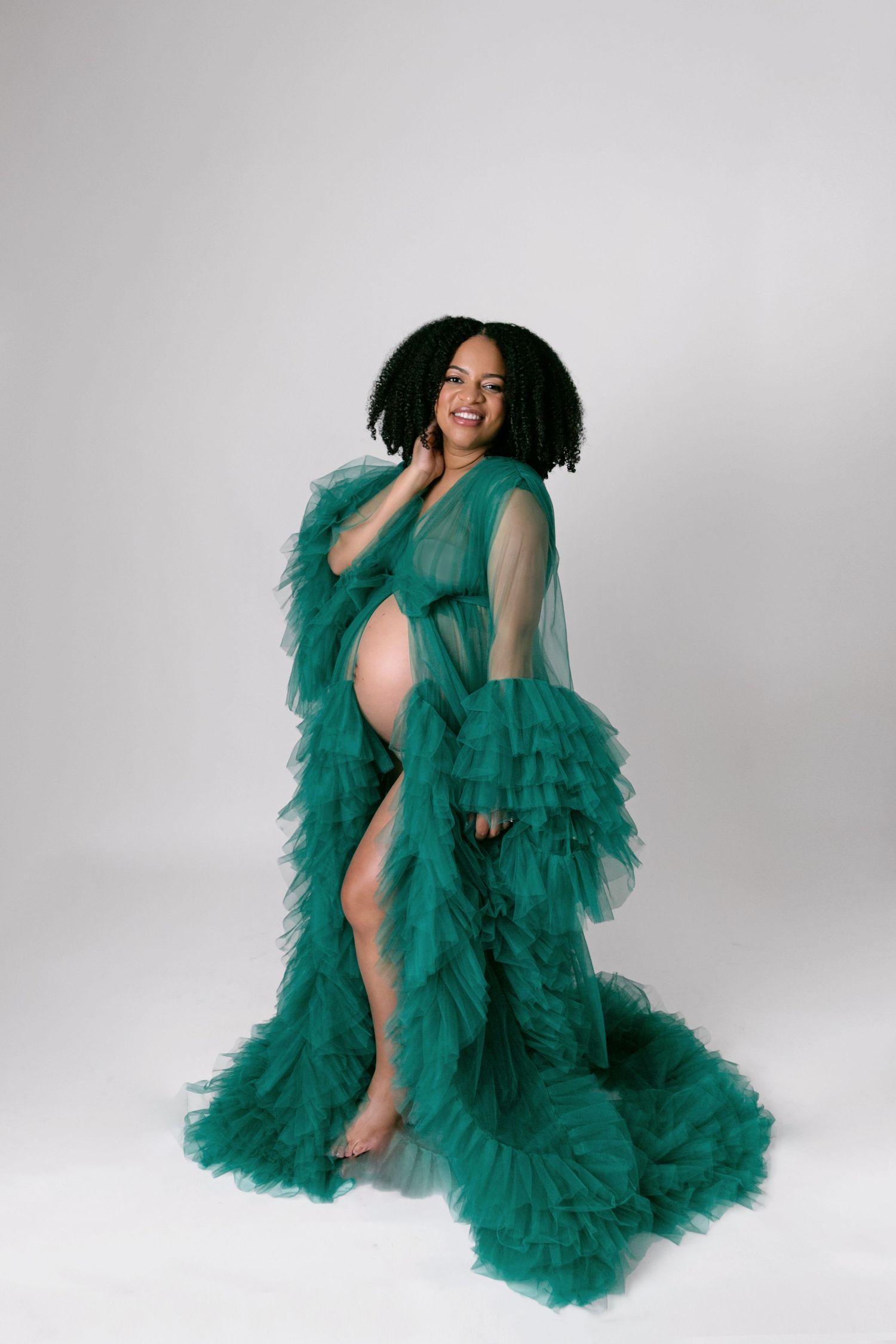 emerald green tulle gown on pregnant woman, Orlando Maternity Photography, Sanford Maternity Photography