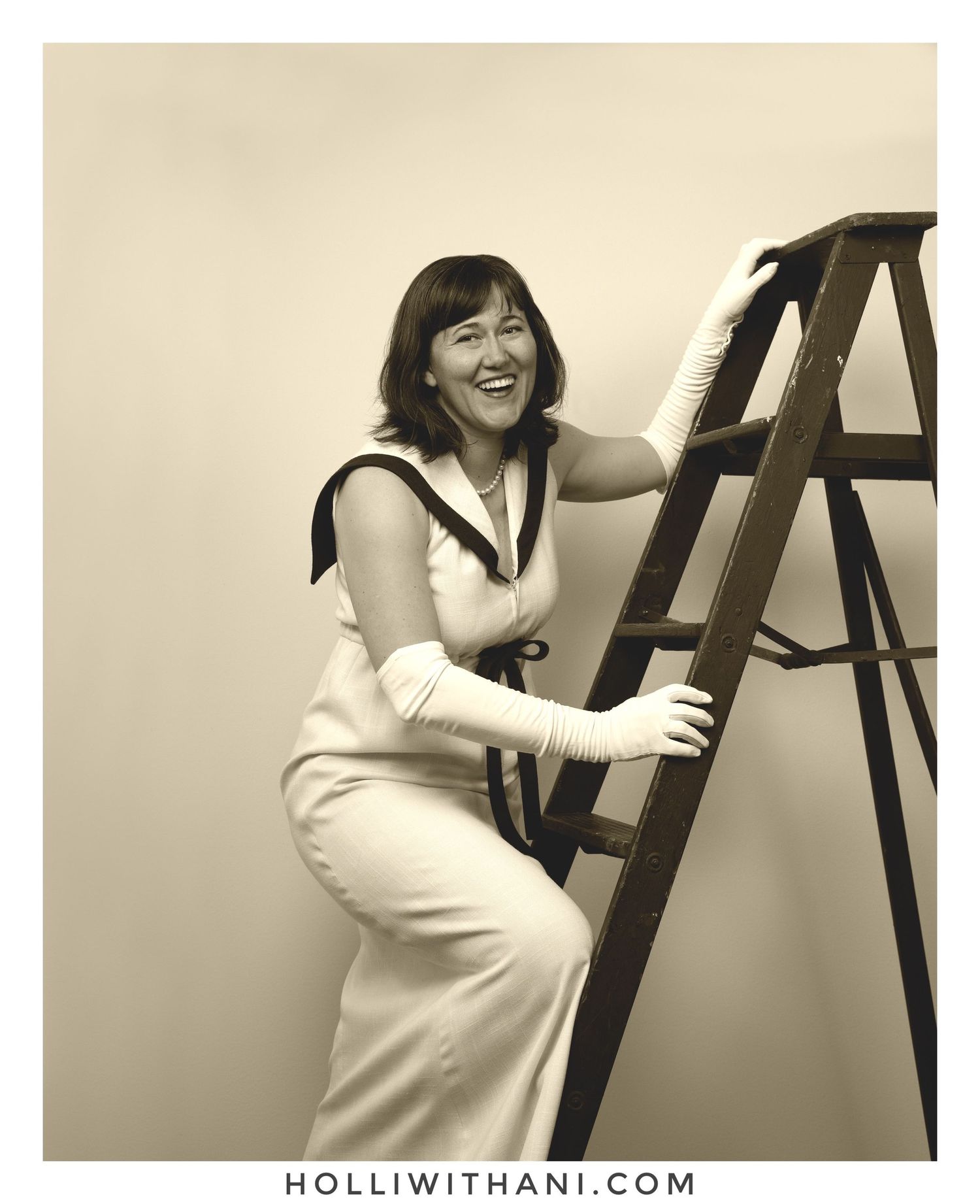 Sepia tone portrait of woman on ladder