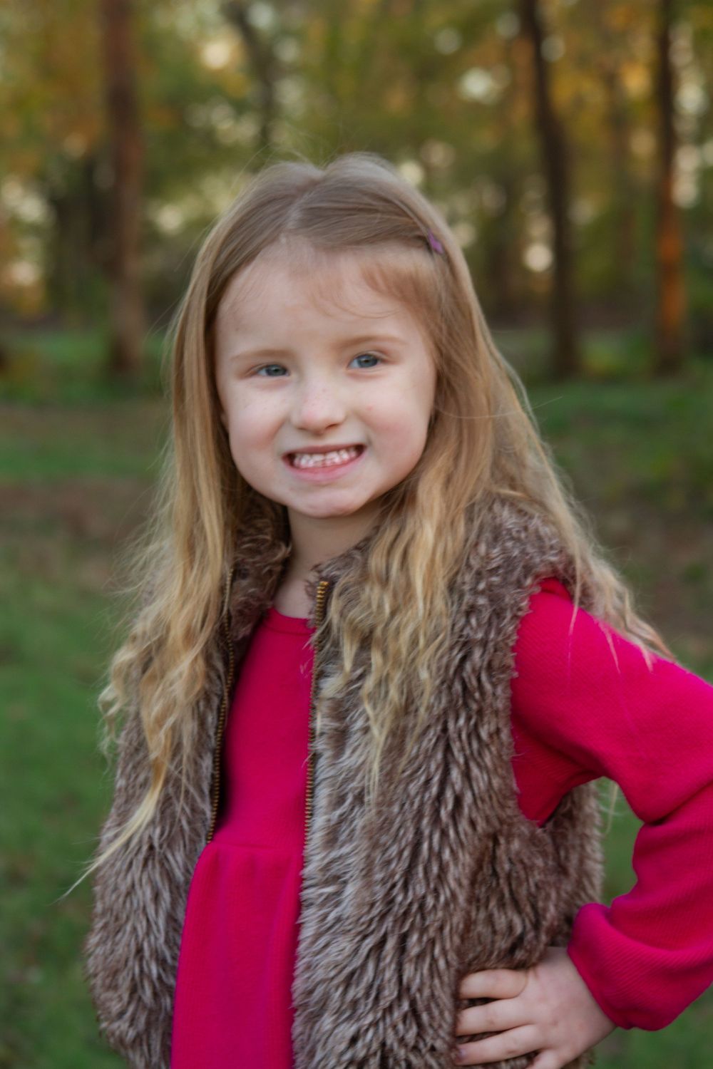 a young in a wooded area photographed by Delta Blossoms Photography in Manila, Arkansas