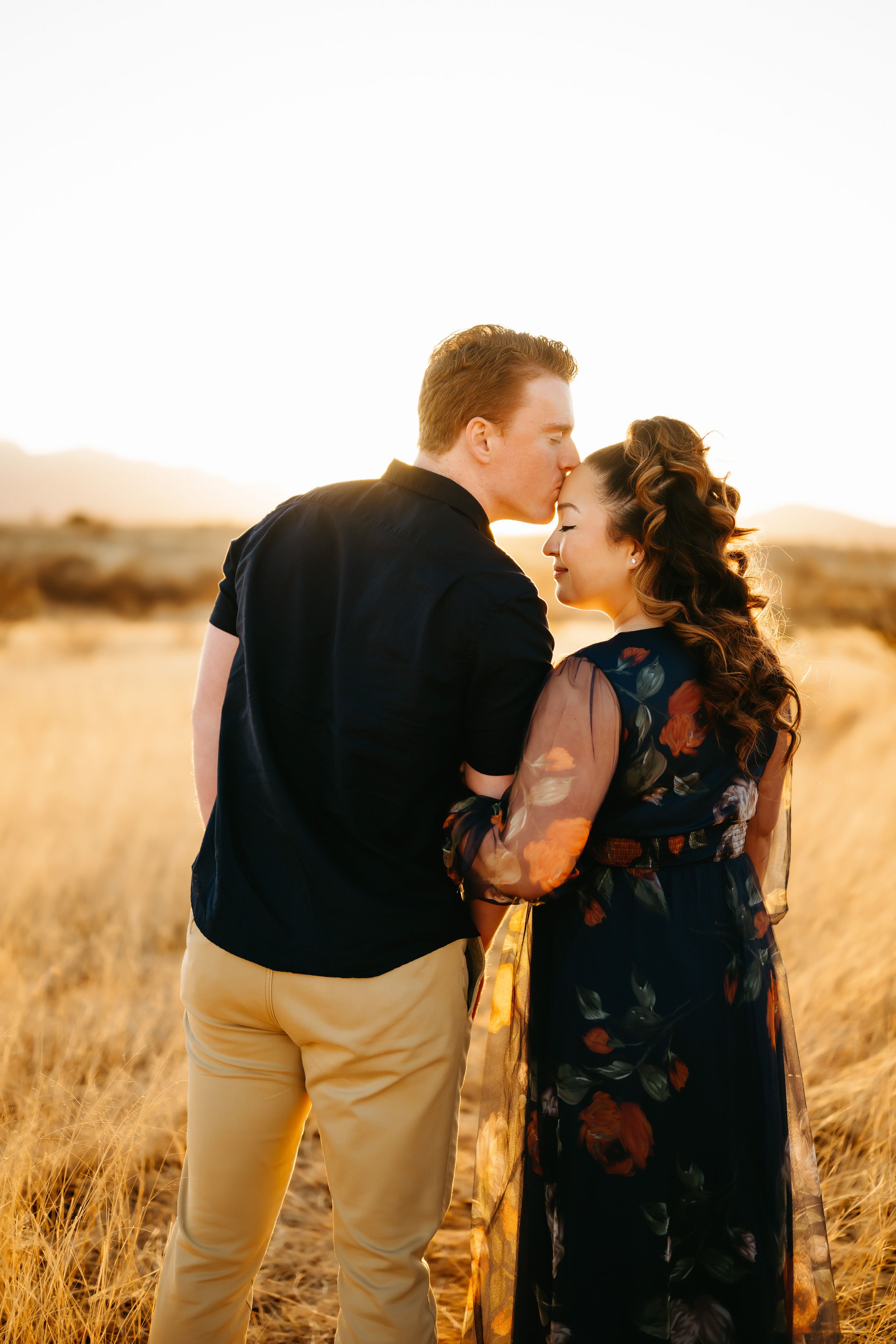 Couple kissing at overlook in Sierra Vista, Arizona