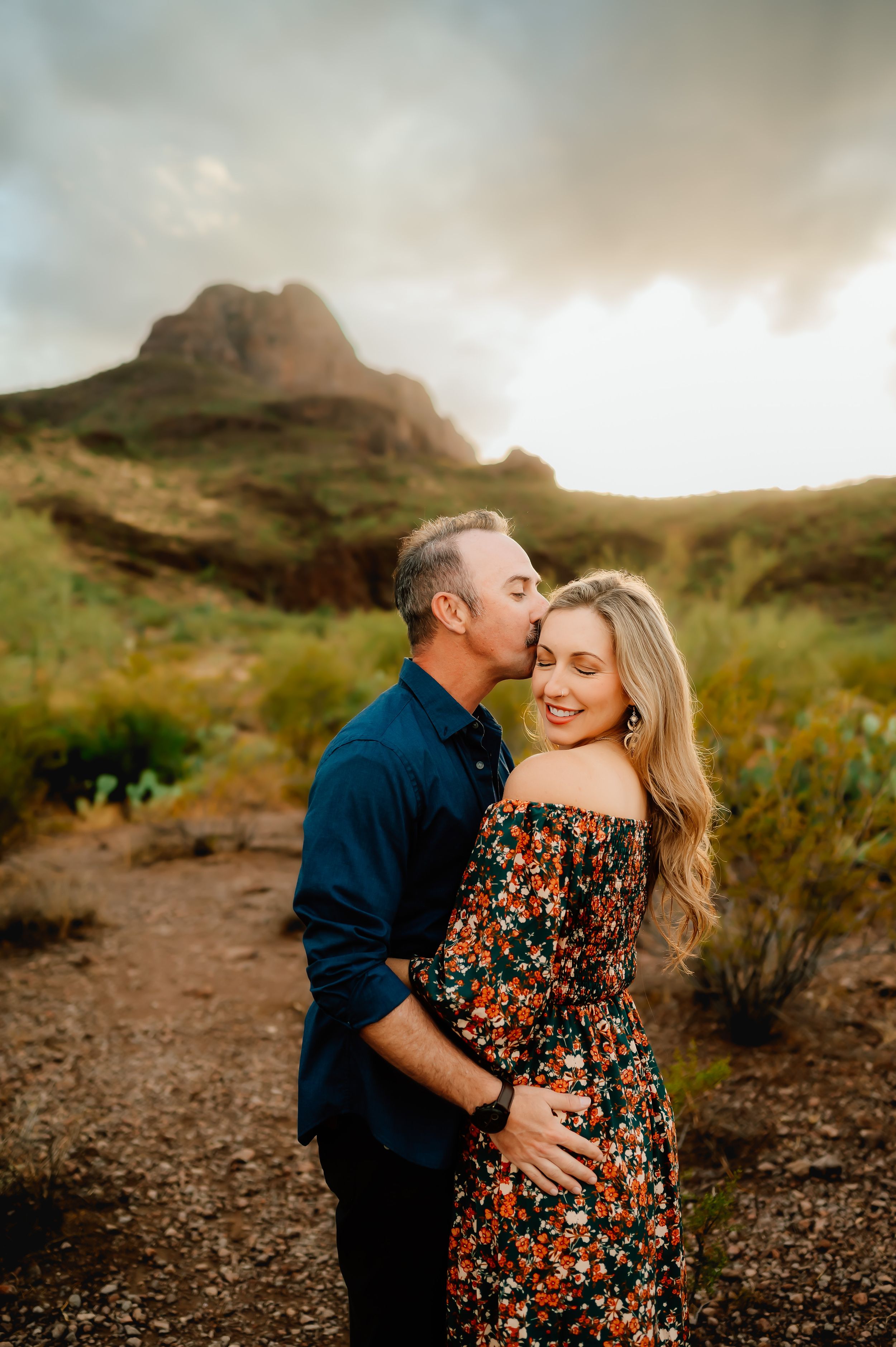 Couple kissing during sunset session in Tucson AZ