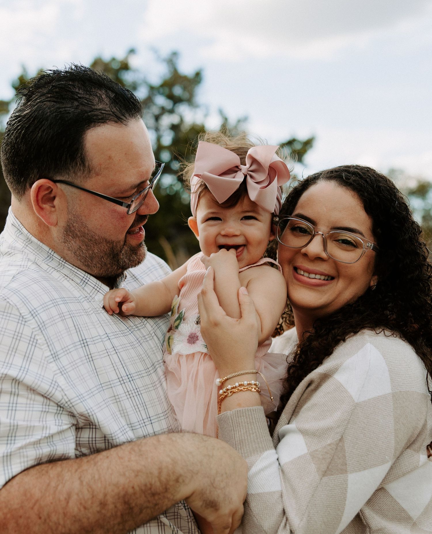 San Antonio Family Photography. A happy family moment captured outdoors with smiles and laughter.