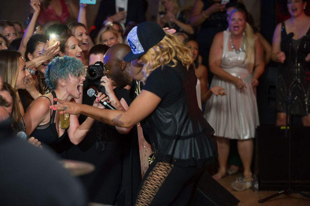 Salt N Peppa singing with the audience at Engage Luxury Wedding Summits at the Nizuc Resort and Spa Cancun, Mexico