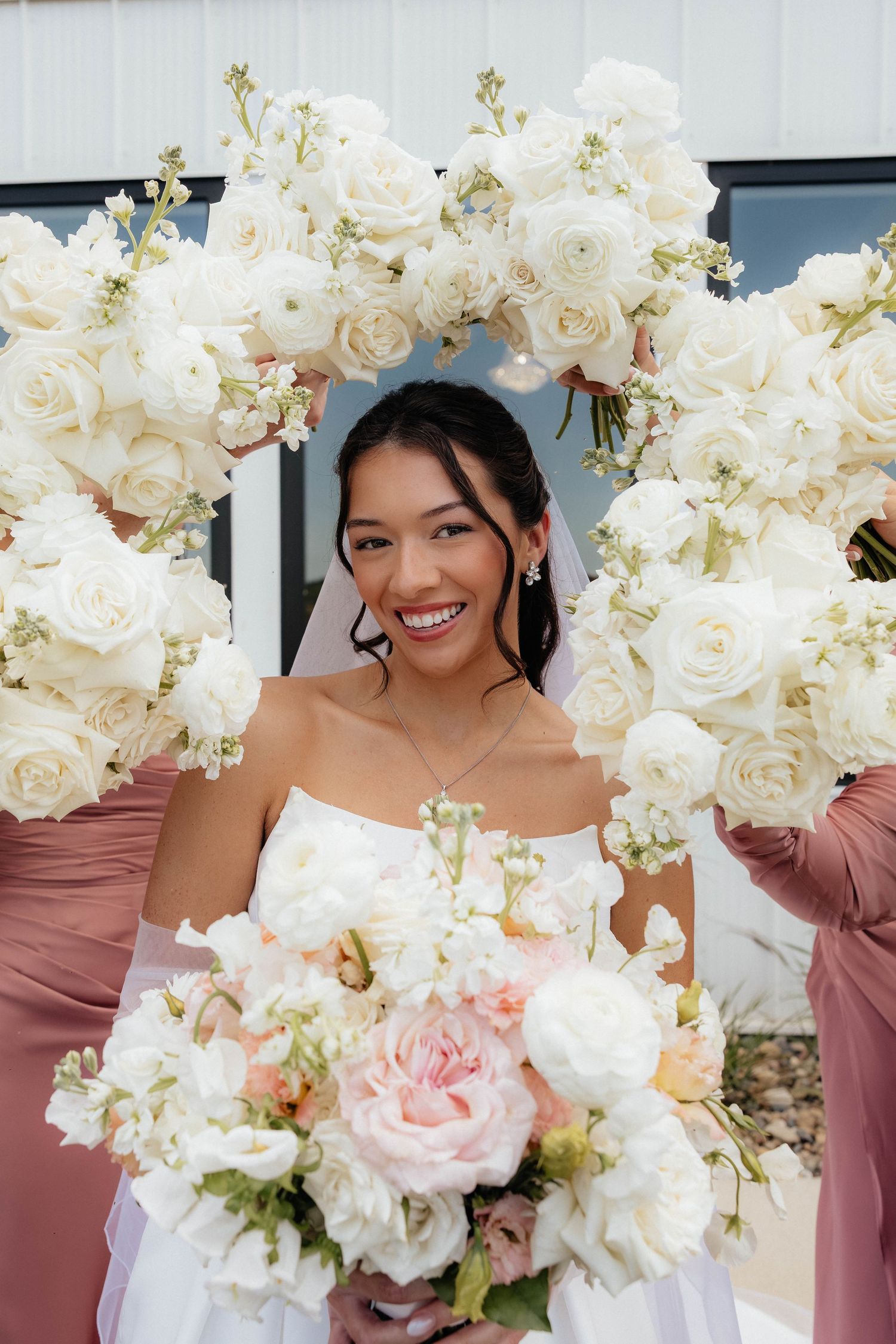 Close-up of bride and groom walking on their wedding day.