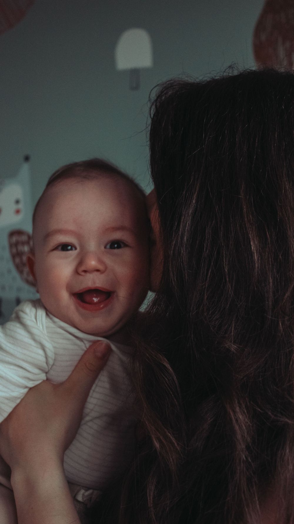 Vancouver Family and Motherhood Photographer offering candid, natural photos for capturing memories of you and baby indoors or outdoors.