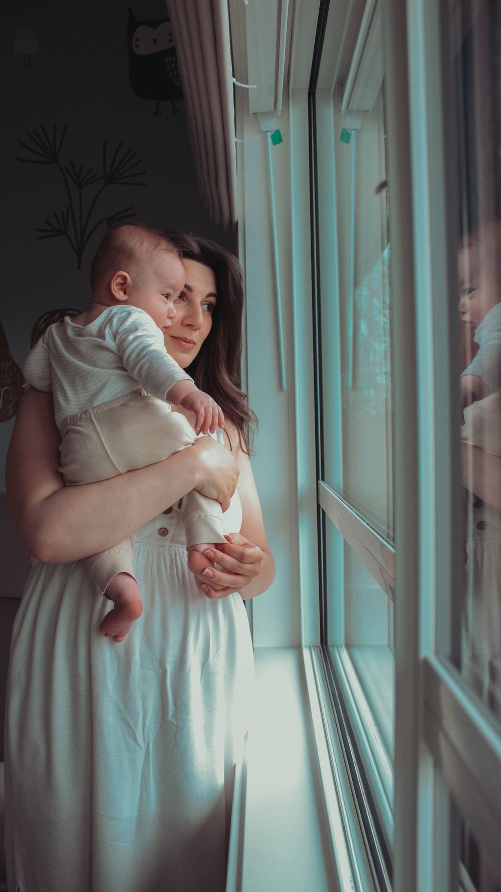 Vancouver Family and Motherhood Photographer offering candid, natural photos for capturing memories of you and baby indoors or outdoors.