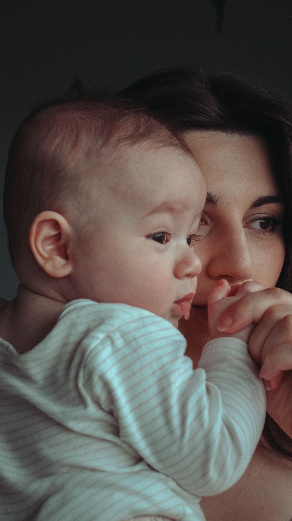 Vancouver Family and Motherhood Photographer offering candid, natural photos for capturing memories of you and baby indoors or outdoors.
