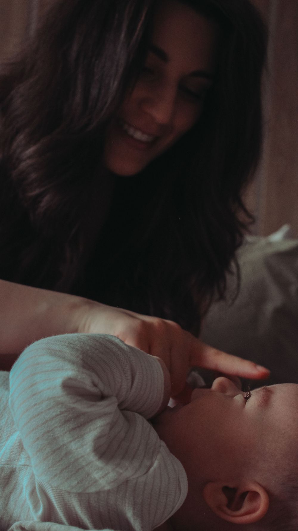 Vancouver Family and Motherhood Photographer offering candid, natural photos for capturing memories of you and baby indoors or outdoors.