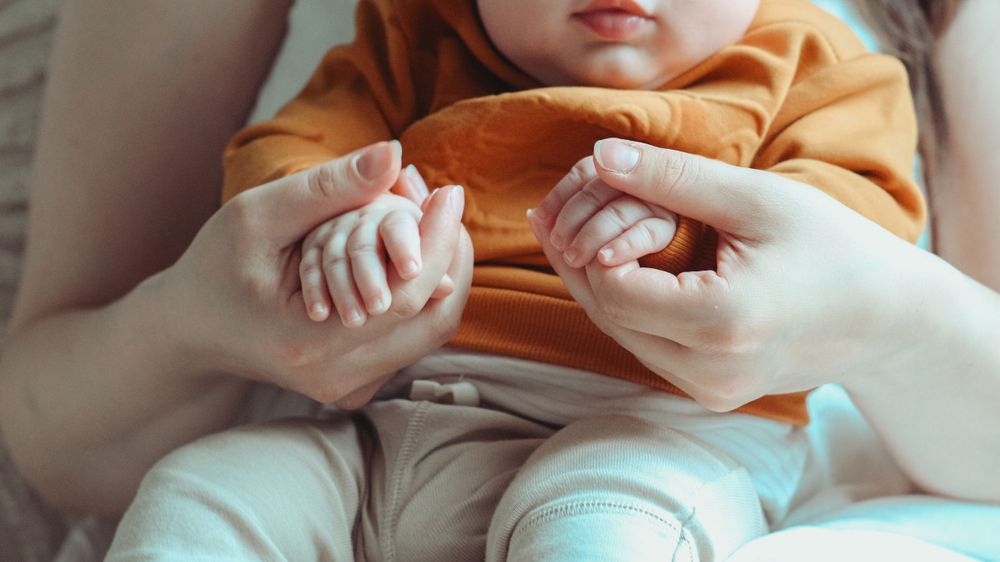 Vancouver Family and Motherhood Photographer offering candid, natural photos for capturing memories of you and baby indoors or outdoors.
