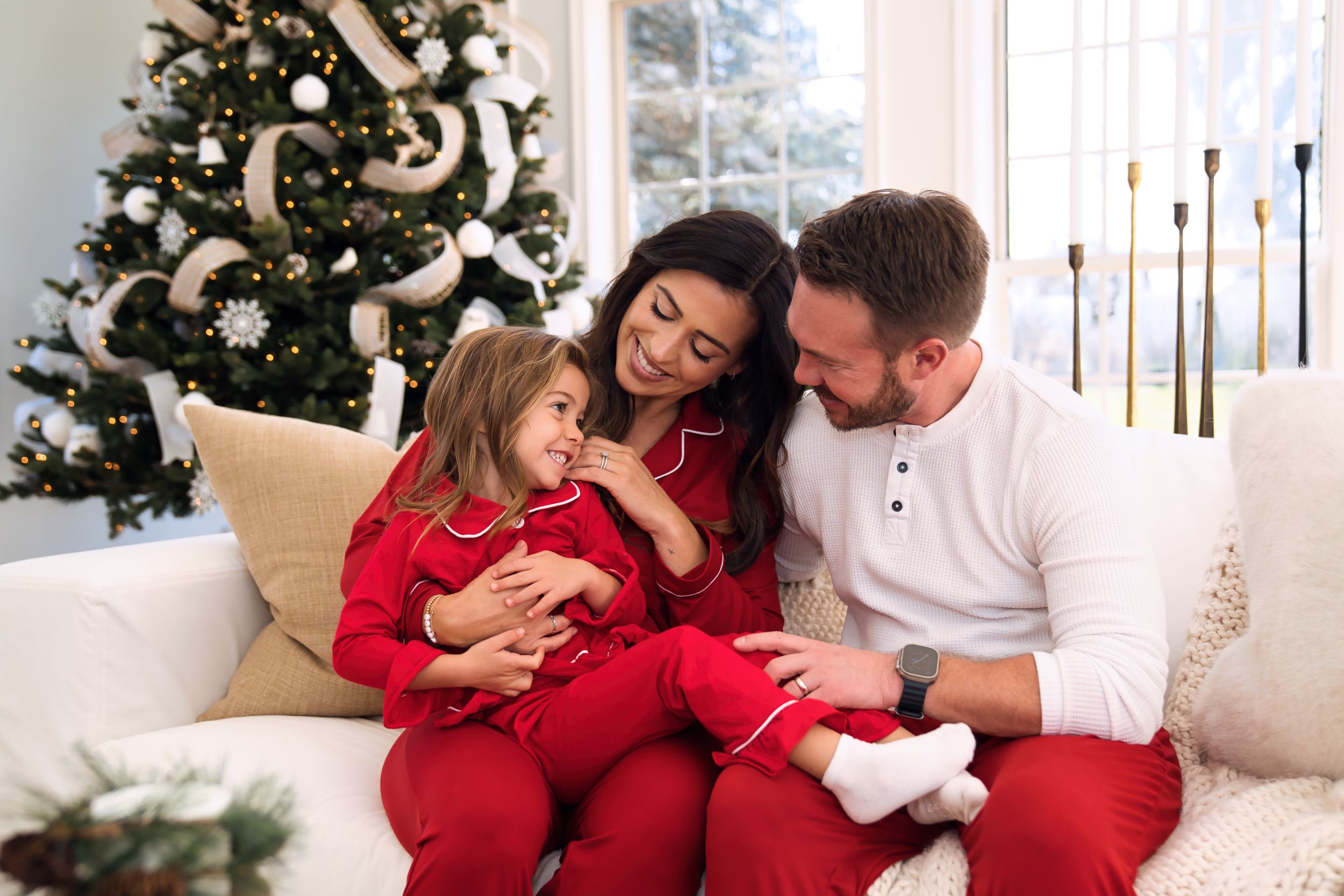 Casey getting Christmas family portraits with her husband and kids in Cincinnati Ohio : Cincinnati Family Photographer