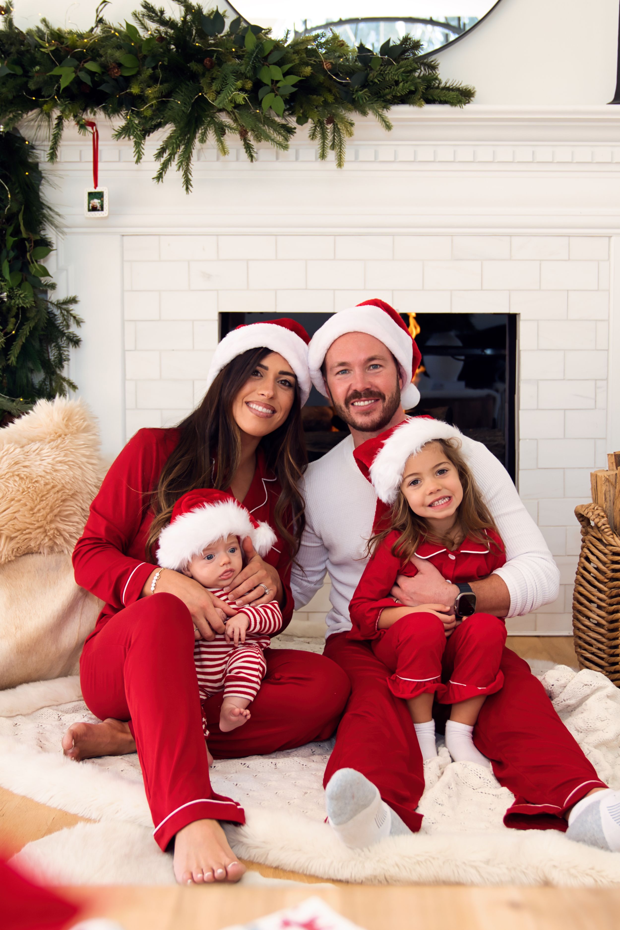 Casey getting Christmas family portraits with her husband and kids in Cincinnati Ohio : Cincinnati Family Photographer