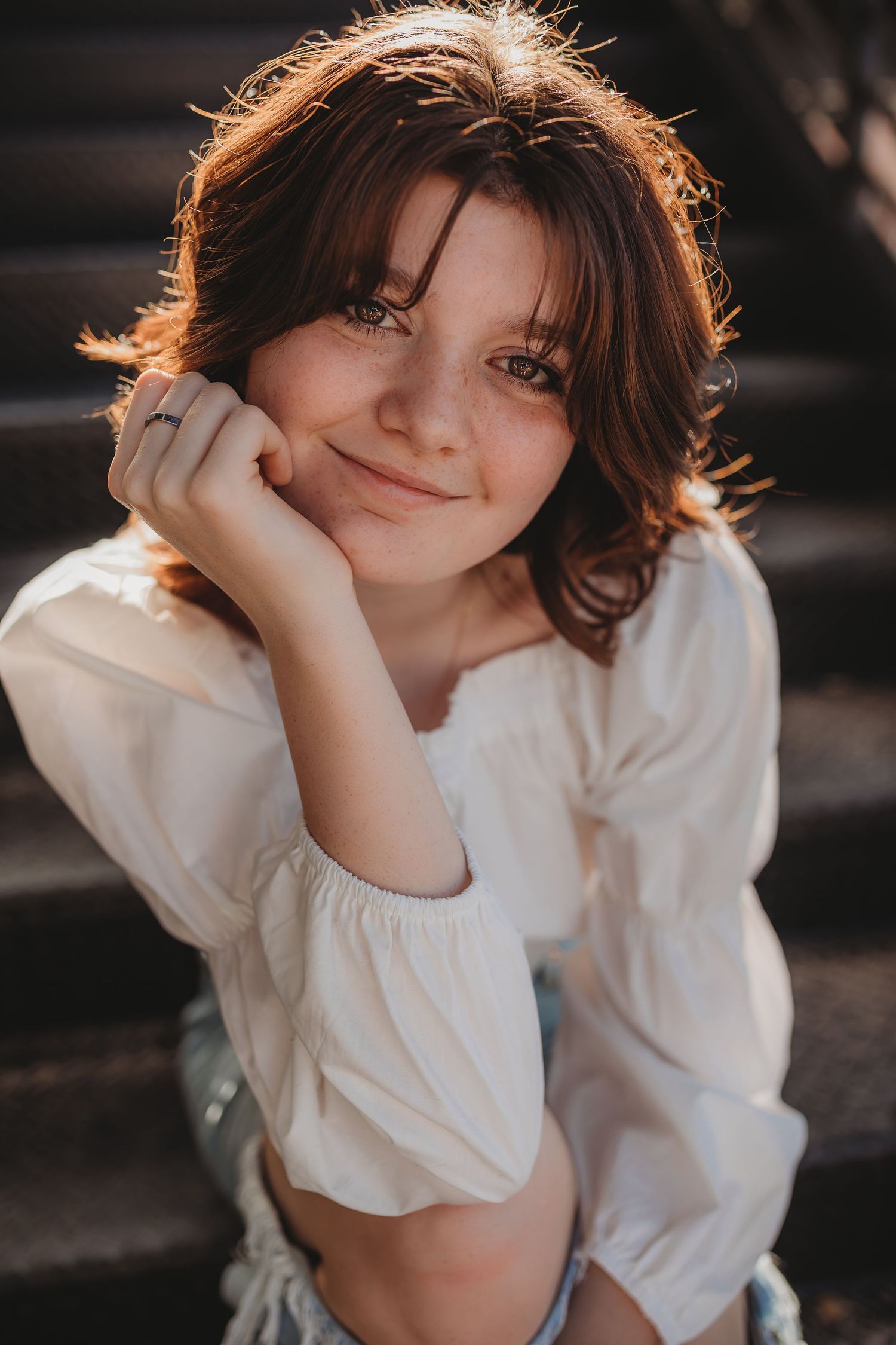 Artistic portrait sequence showing playful expressions in warm sunlit tones.