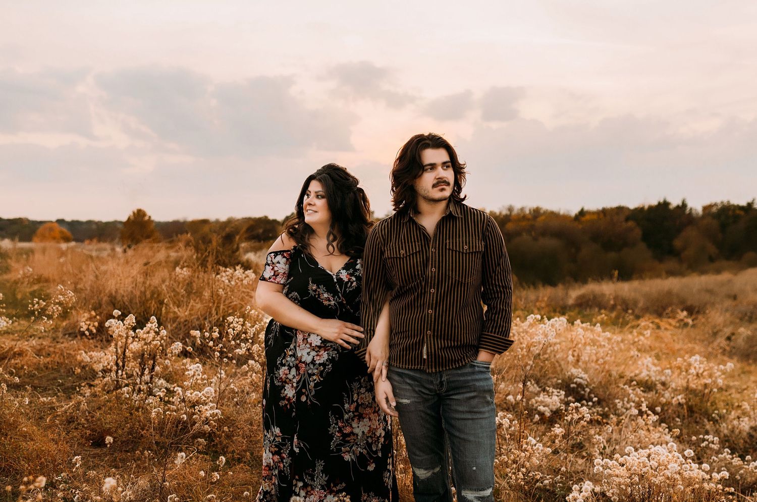 mother and her son pose in a field