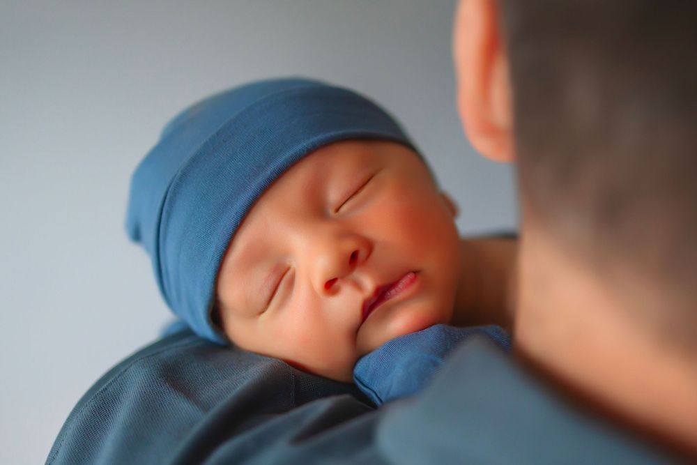 close up of a newborn baby boy at an at home newborn photoshoot