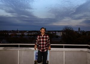 Series of outdoor portrait shots against a sunset sky and cityscape backdrop.