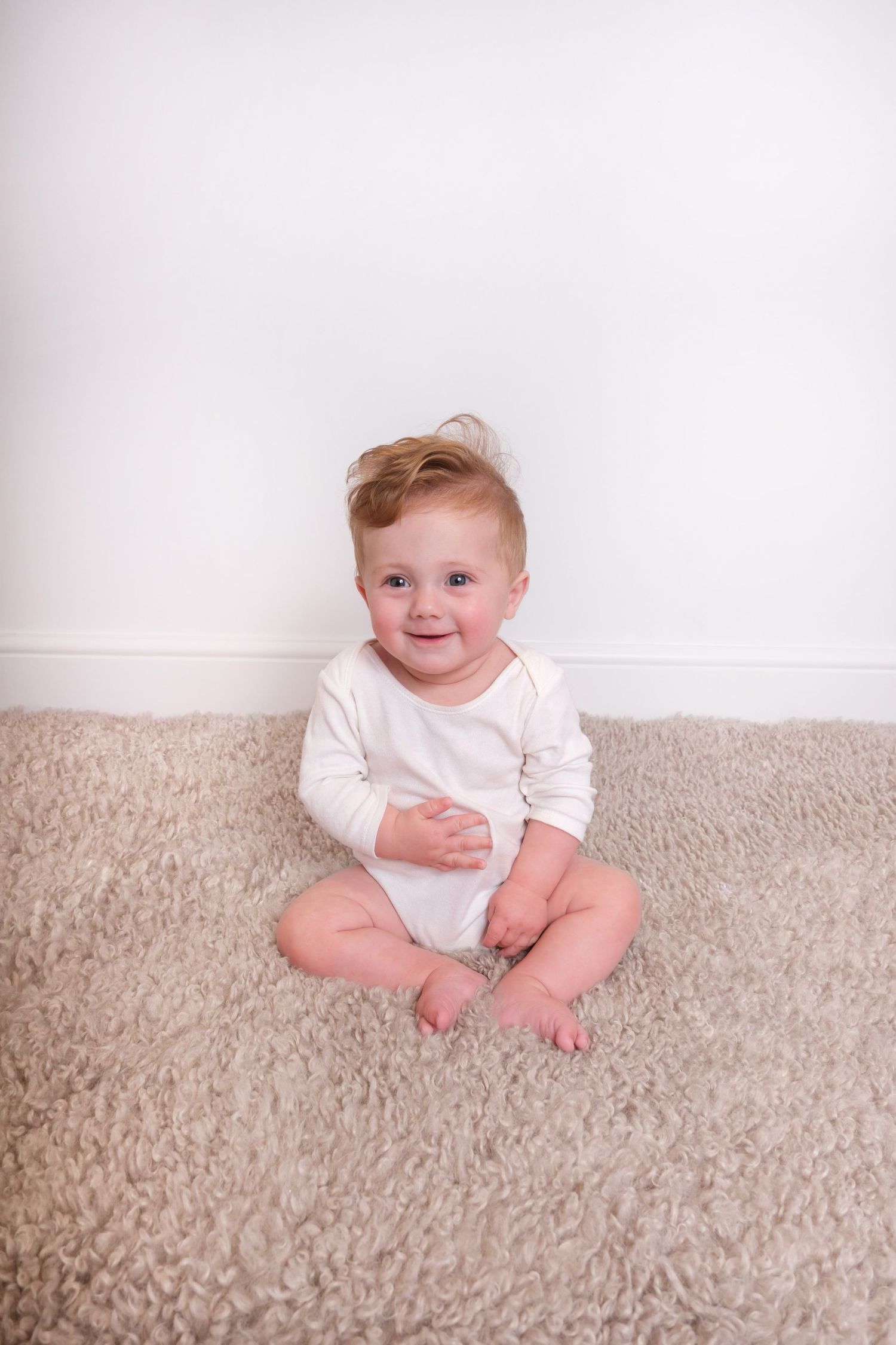 young boy smiling at the camera