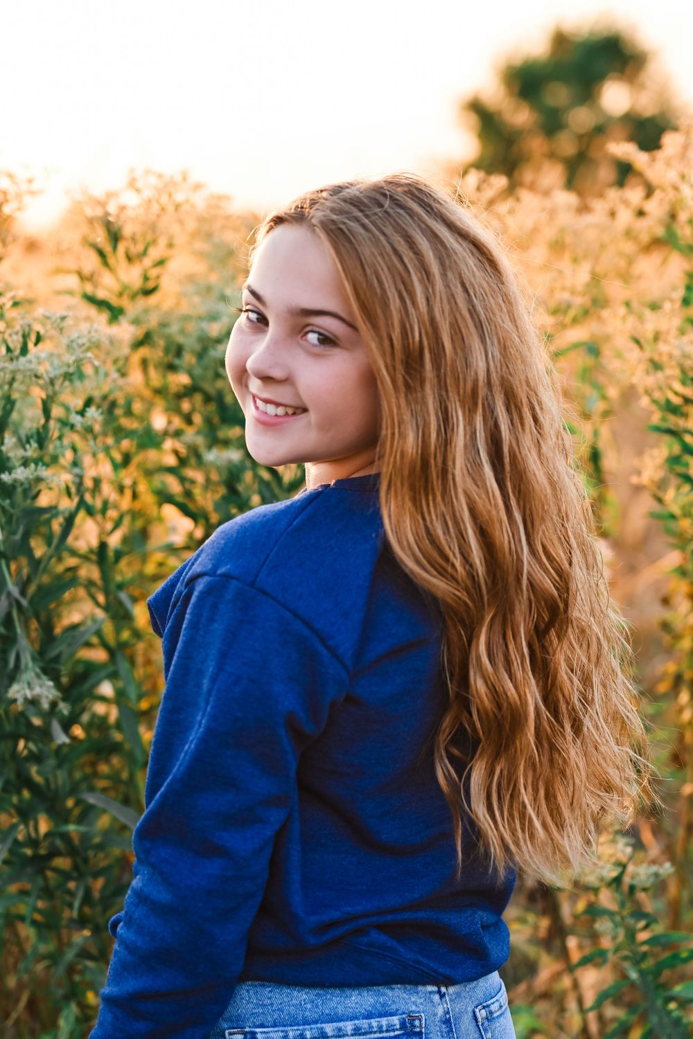 Pre-teen girl poses for photographer, Melissa J. Conwell Photography.