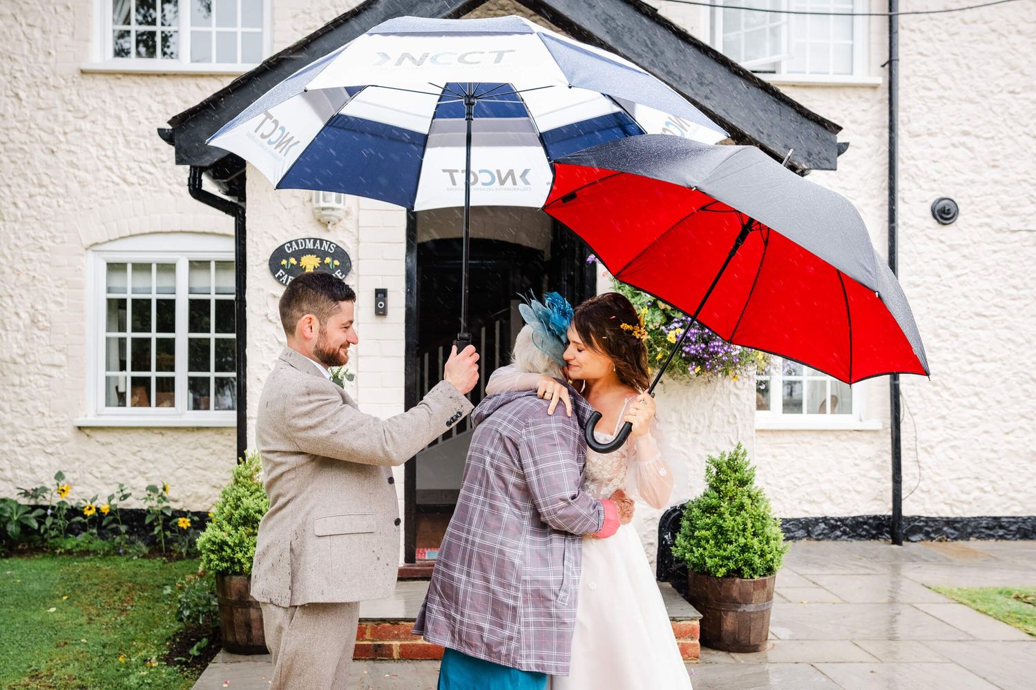 Kent Wedding Photographer Bride Groom Grandparent hugging