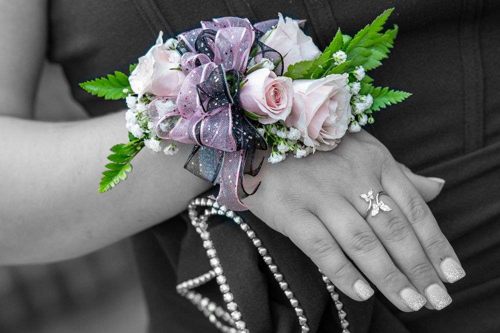 Corsage for prom made of pink and purple in a background of black and white, Anderson, South Carolina.