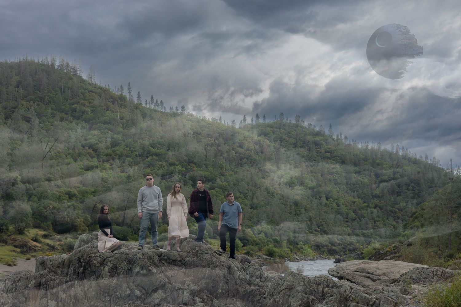Dramatic mountain landscape photo session with moody overcast skies and rugged terrain.