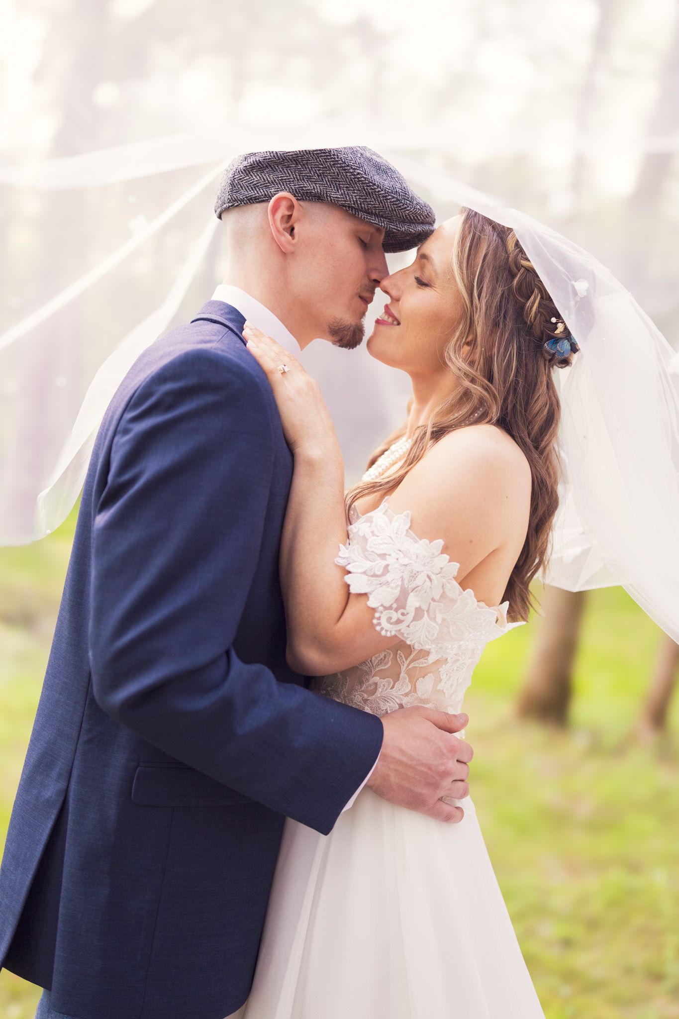 Romantic outdoor portrait series showing gentle embraces against a natural landscape.