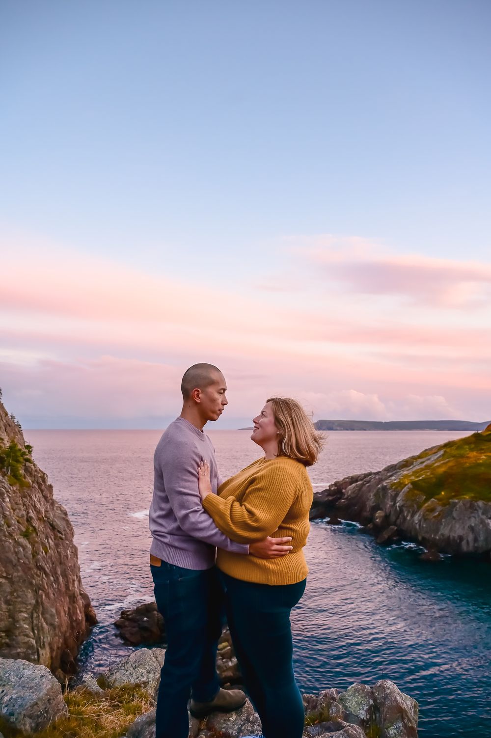 Couple portrait in Quidi Vidi surrounded by autumn colours and coastalline in St. John’s Newfoundland