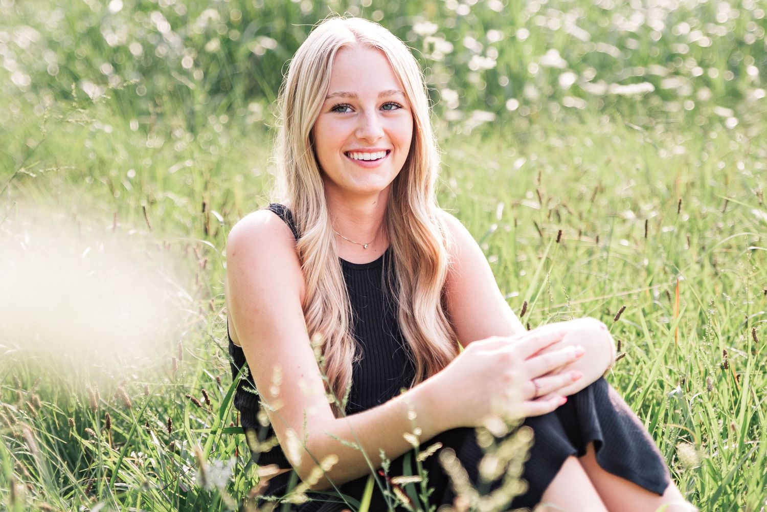 A senior girl's portrait in a field in western Kentucky.