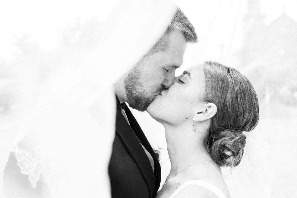 Wedding couple under the veil