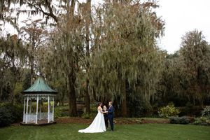 A romantic wedding photo sequence under Spanish moss draped trees with a white gazebo in the background.