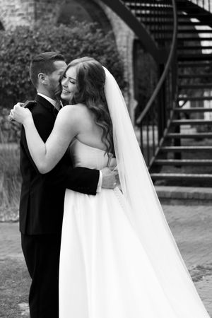 A series of black and white wedding photos showing a couple in intimate dancing poses with the bride in a flowing white gown.