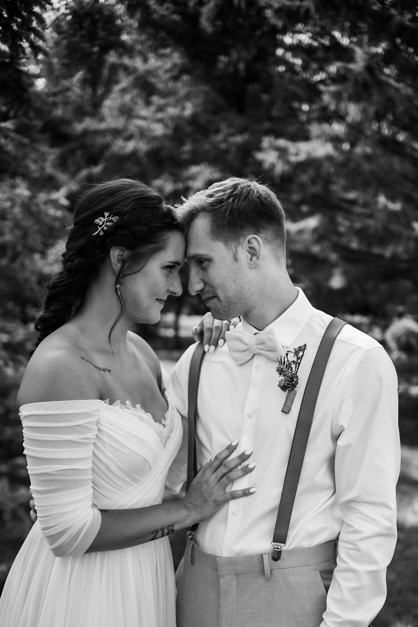 Intimate wedding portraits showing tender moments between newlyweds.