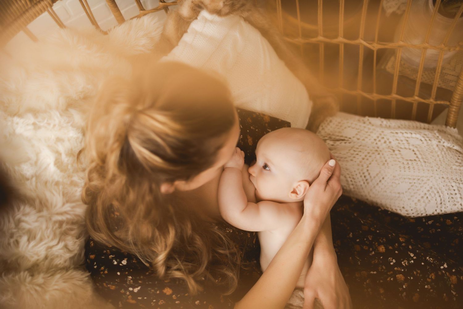 Nursing mini session in Urso Photography’s studio, capturing tender moments between mother and baby in Chattanooga.