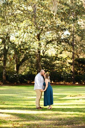 A romantic proposal scene unfolds in a scenic park setting with golden sunlight filtering through trees.