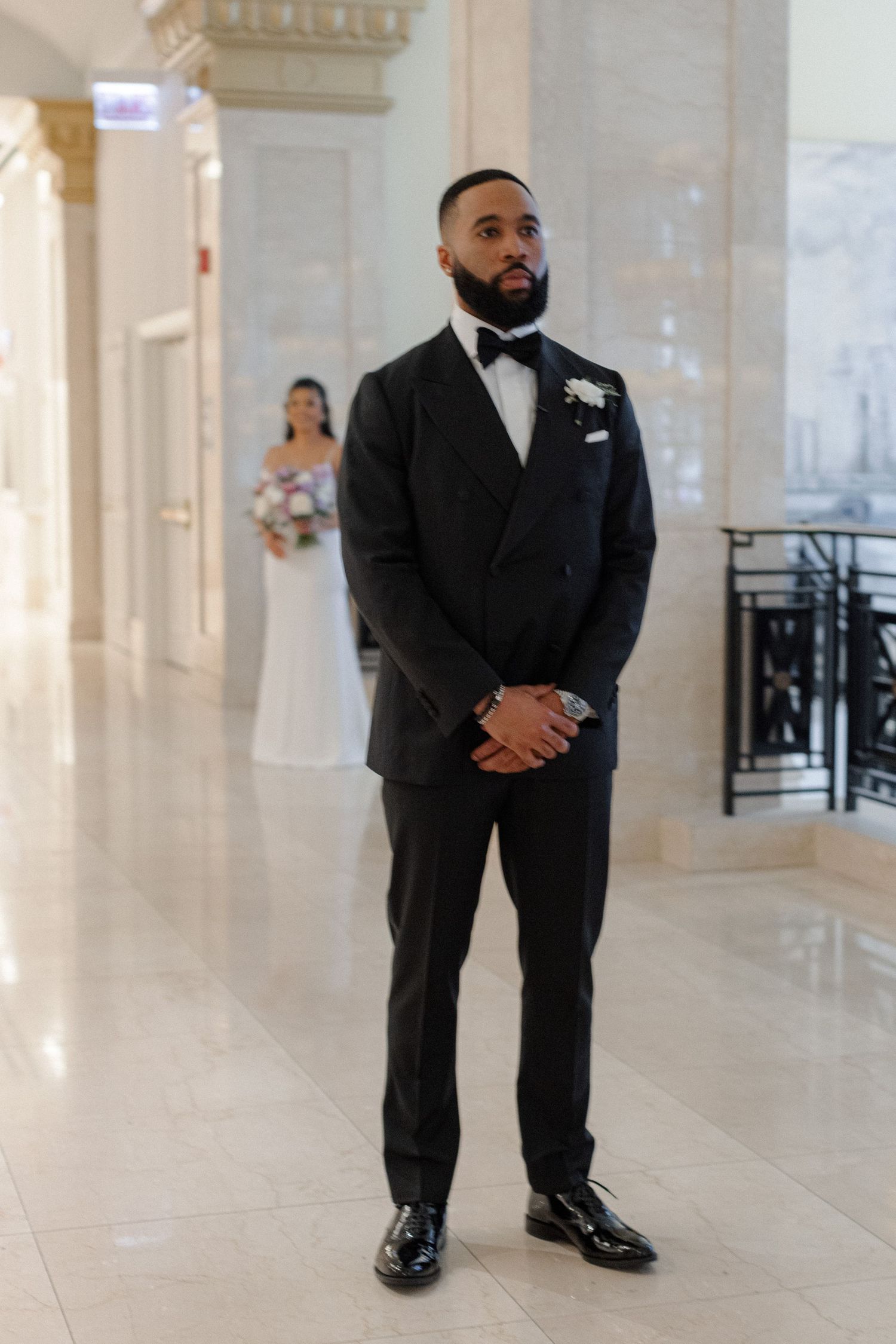Formal event space with marble floors and classical architectural details.