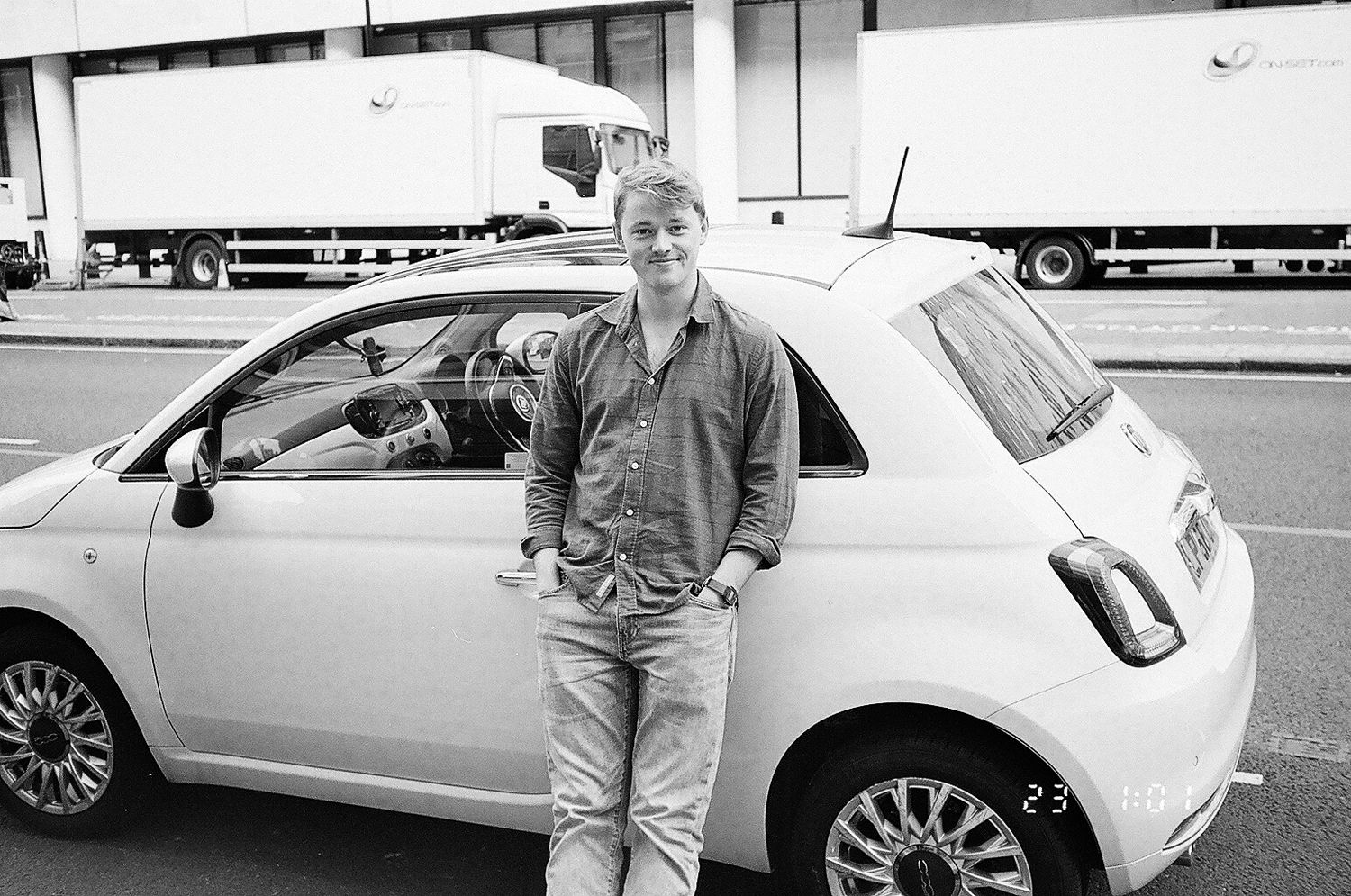 Photographer outside his car