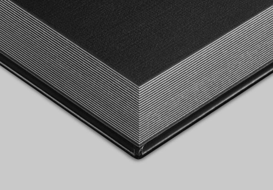 Close-up of square photo paper, highlighting its smooth texture and even edges.