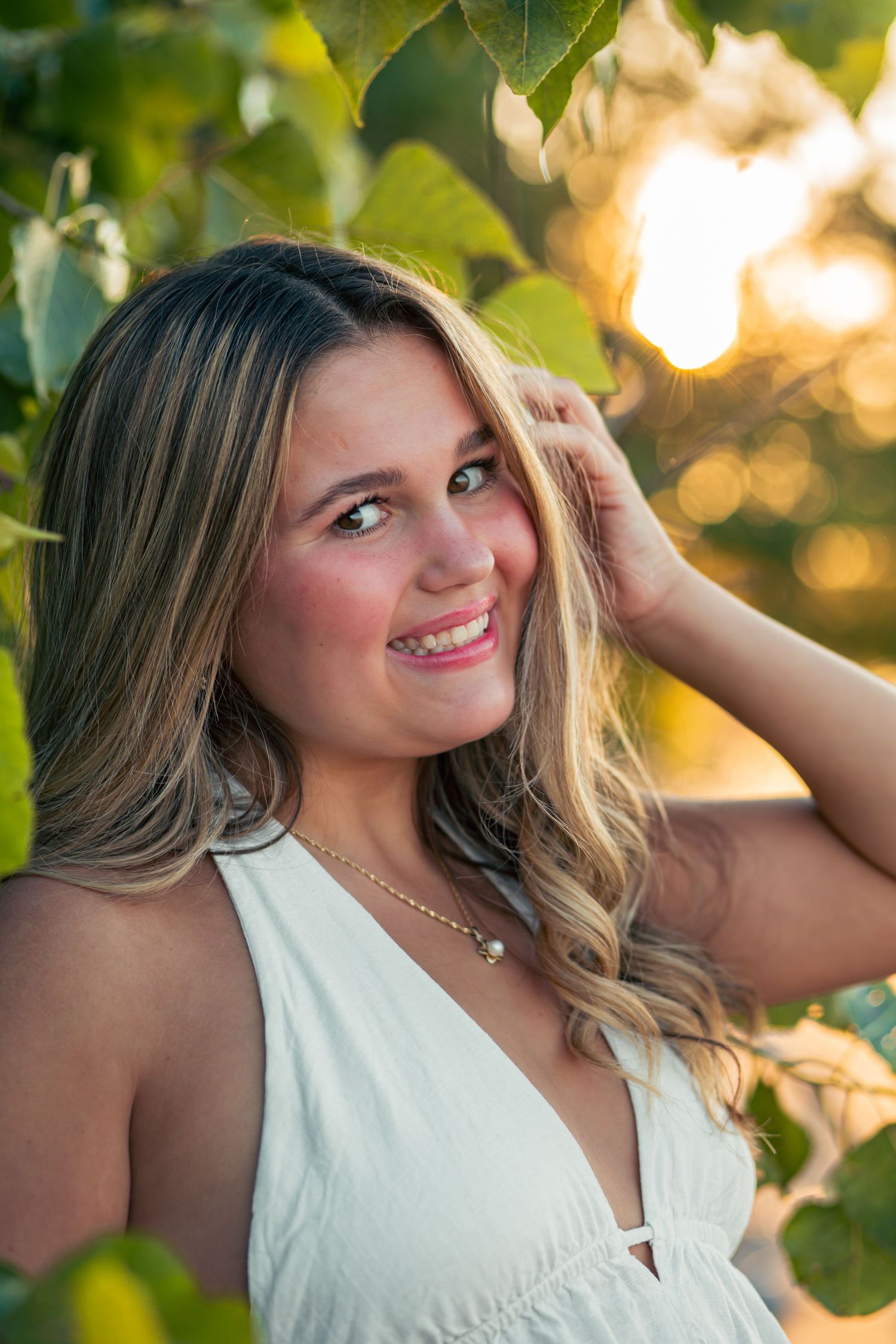 Senior session in a corn field at sunset.