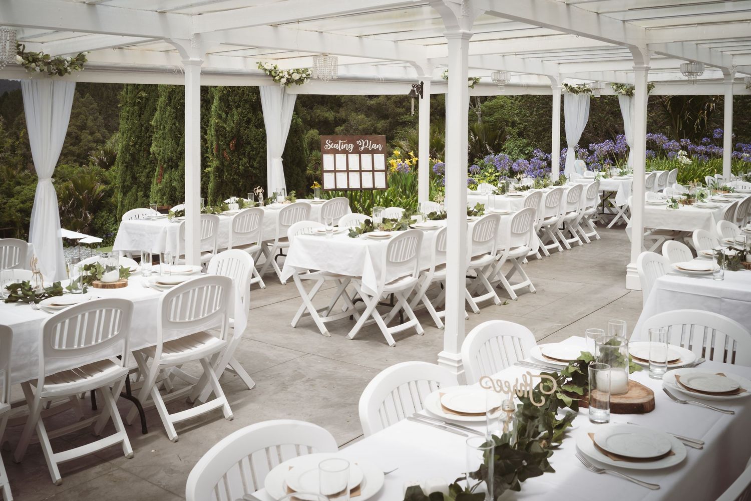 bridgewater estate reception seat setting with white chairs