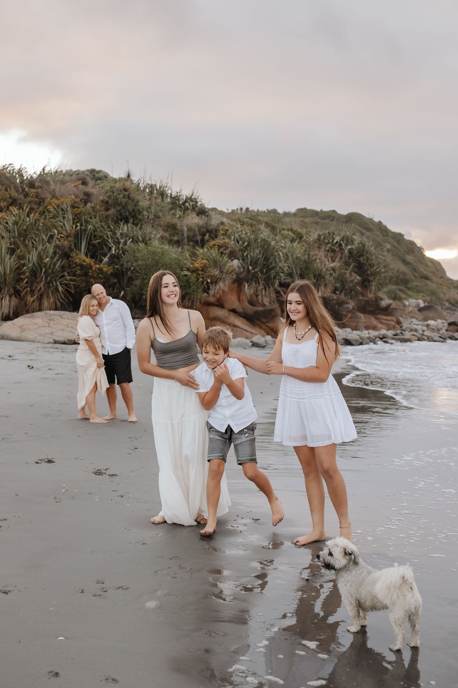 Erin Adams, family moments outdoors in Westport in golden hour light, capturing candid moments