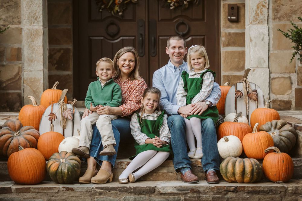 Family session with parents and small children in fall