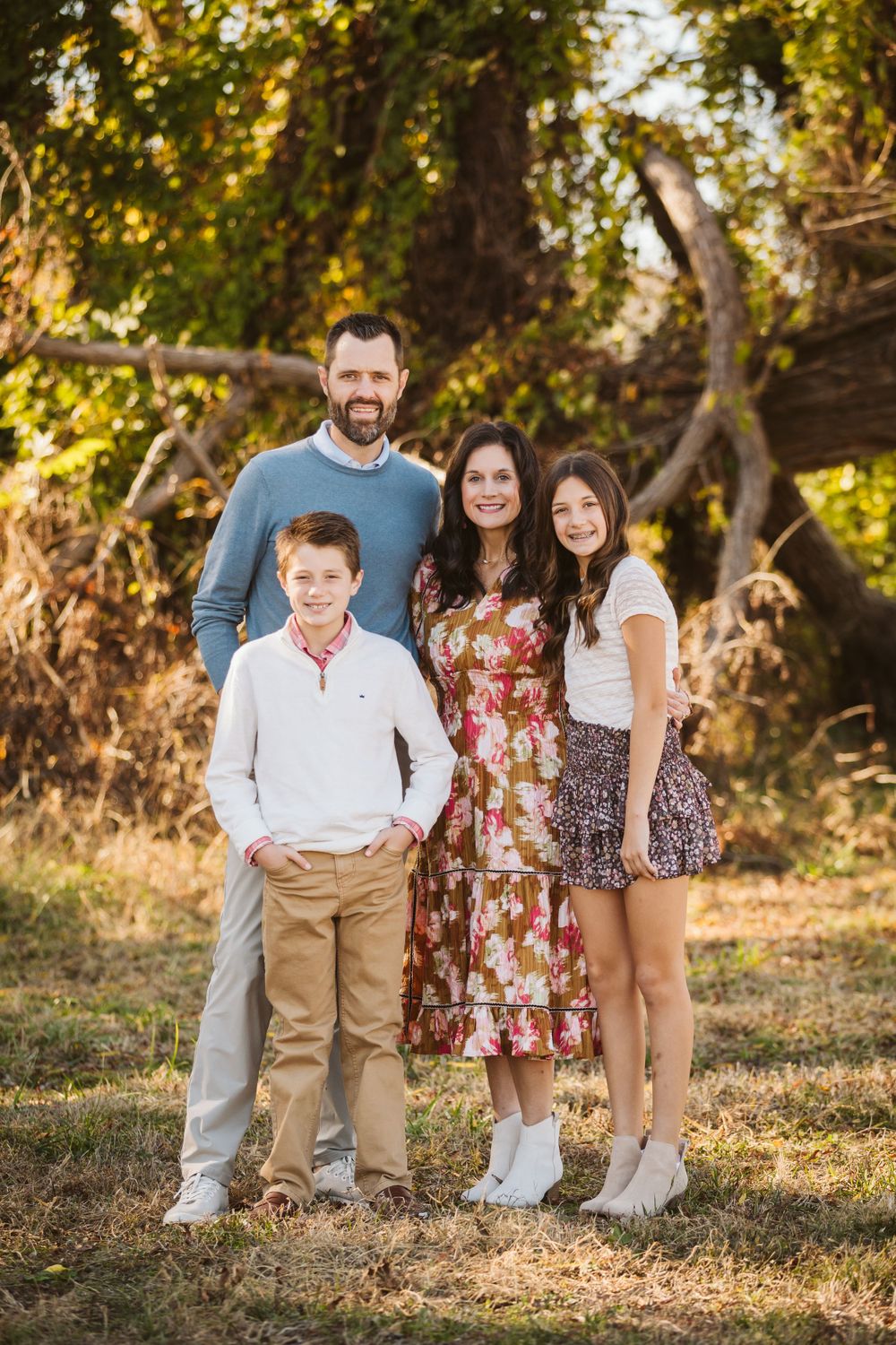 Family session with parents and teen children in fall
