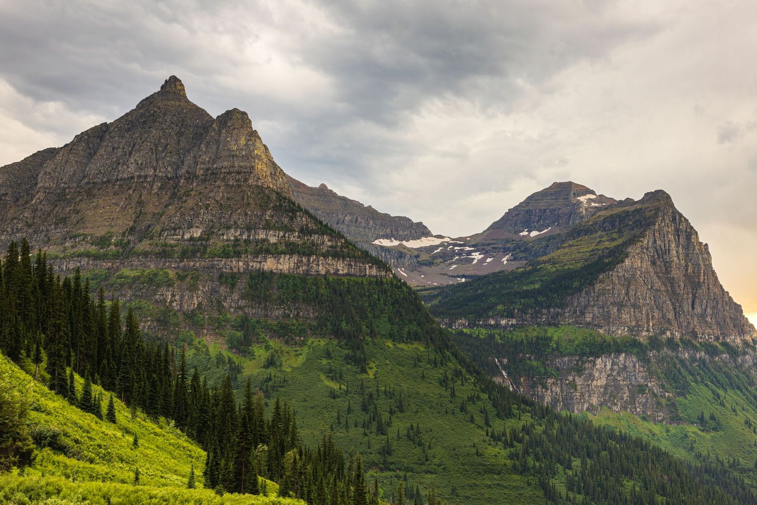 View of Heaven's Peak after a storm during sunset at Logan Pass on the Going to the Sun Road in Glacier National Park, Montana.