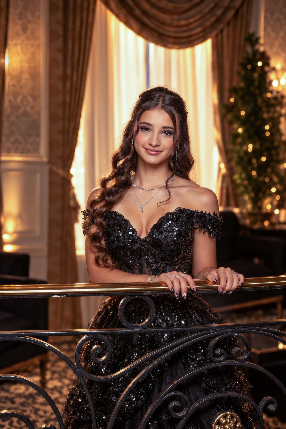 Young woman in black sequin off-shoulder gown poses elegantly by ornate railing in luxurious golden interior.