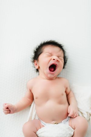 Newborn photography in studio of family and children based in Colorado including baby details
